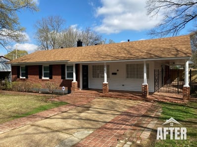 Curbside view of renovated property, titled "After"