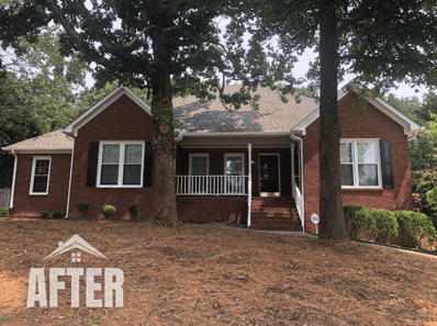 Curbside view of a property, titled "After"