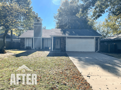 Curbside view of renovated property, titled "After"