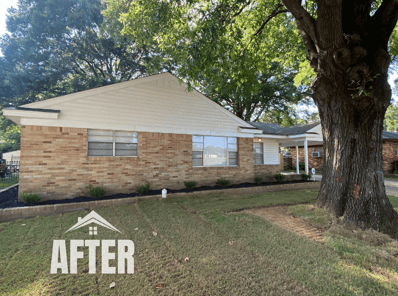 Curbside view of renovated property, titled "After"