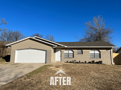 Curbside view of renovated property, titled "After"