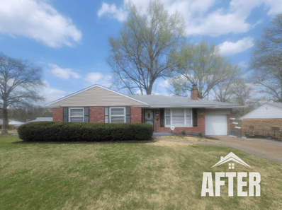 Curbside view of renovated property, titled "After"