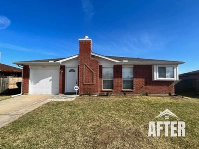 Curbside view of renovated property, titled "After"