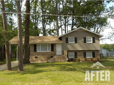 Exterior "after" photo of a split level home