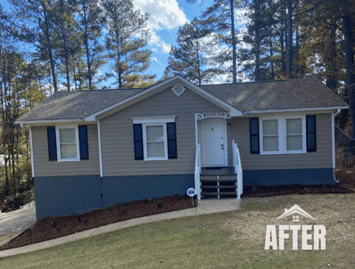 Curbside view of renovated property, titled "After"