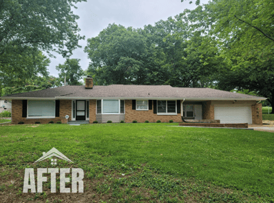 Curbside view of renovated property, titled "After"