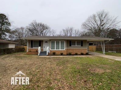 Curbside view of renovated property, titled "After"