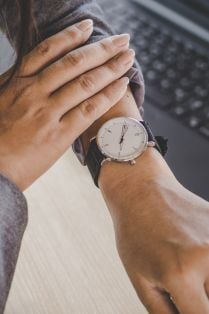 Woman looking at watch