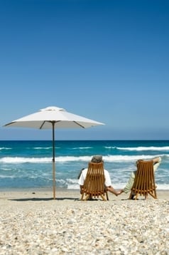 Retired couple on the beach
