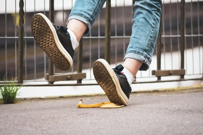 Person slipping on a banana peel