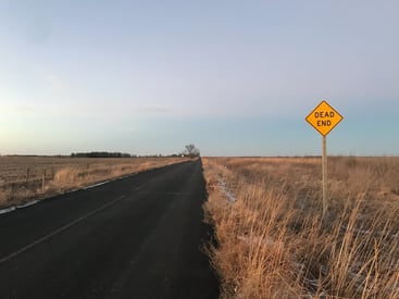 Dead end sign on rural road