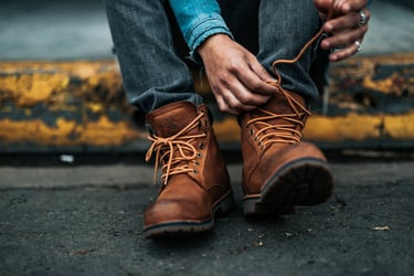 Man tying shoelaces