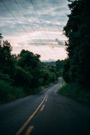 Empty back road at liminal time of day