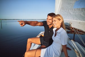 growing your portfolio turnkey real estate long term wealth couple on boat